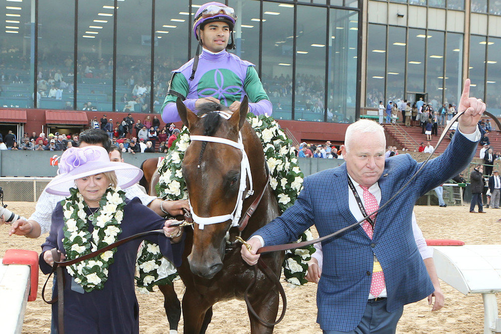 Robert, right, and Lawana Low in April 2018 celebrate Magnum Moon’s Arkansas Derby win. He was ridden by Luis Saez.
